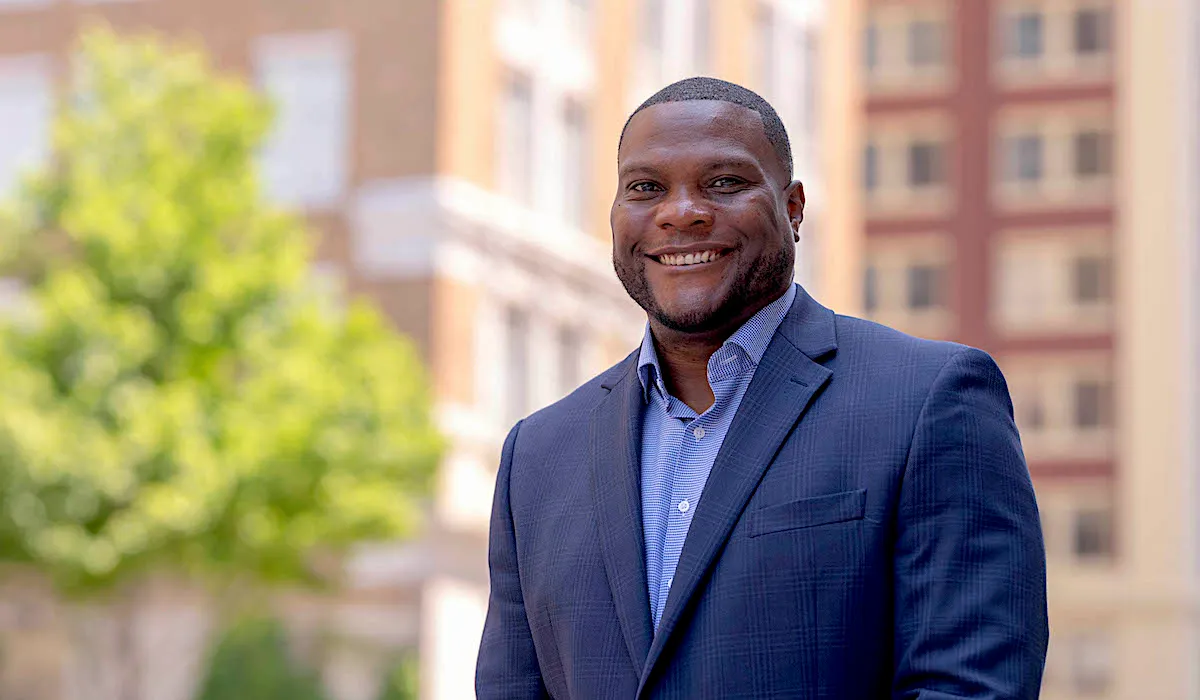 Tulsa mayor Monroe Nichols IV smiling in a navy suit